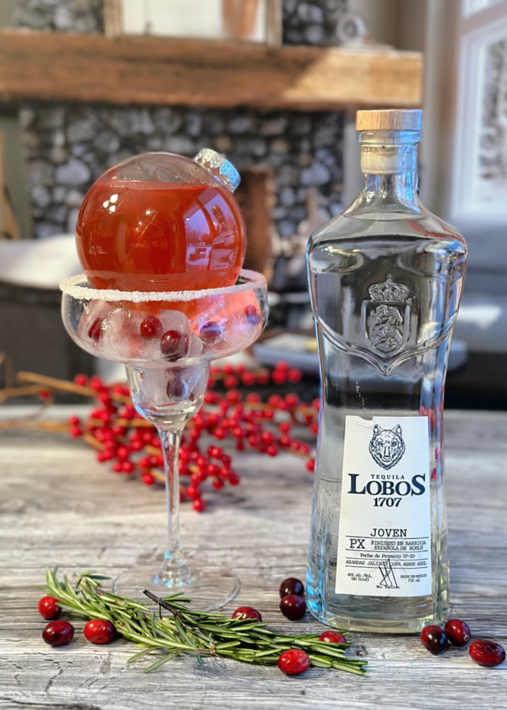drink in a clear ornament in an ice filled glass